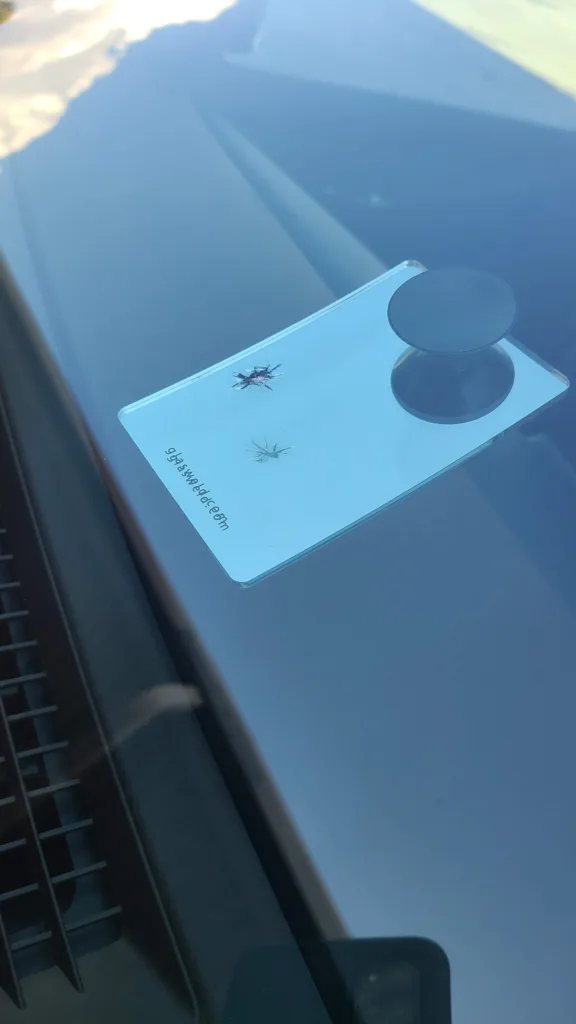Rock chip repair on a windshield